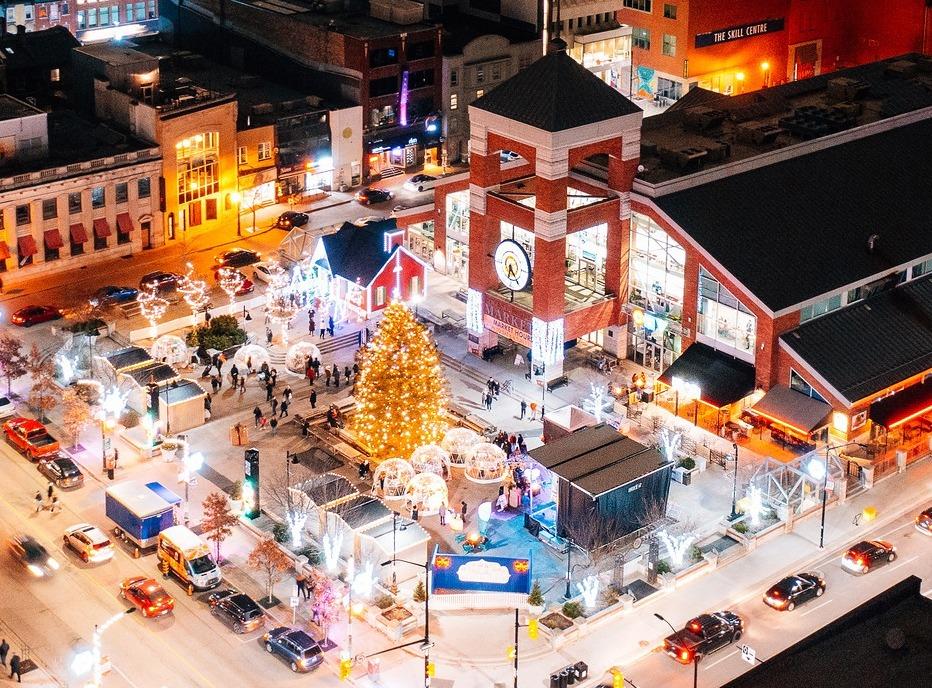 A bright lit Christmas tree in front of Covent Garden Market's main entrance located in London, Ontario